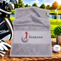 Preview: Personalisiertes Golfhandtuch in Mittelgrau mit Golferin und Wunschname