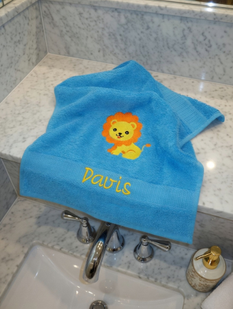 Handtuch türkisblau Löwe