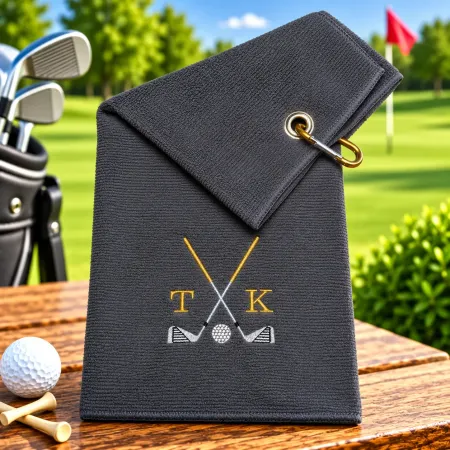 Graues Golfhandtuch mit Initialen T K in Gold bestickt