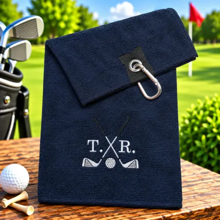Marineblaues Golfhandtuch mit Initialen T. R. und Golfmotiv bestickt