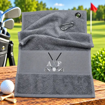 Mittelgraues Golfhandtuch mit Initialen A F und Golfmotiv bestickt