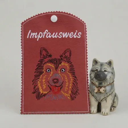 Hellrote Impfausweishülle Shetland Sheepdog fertig bestickt