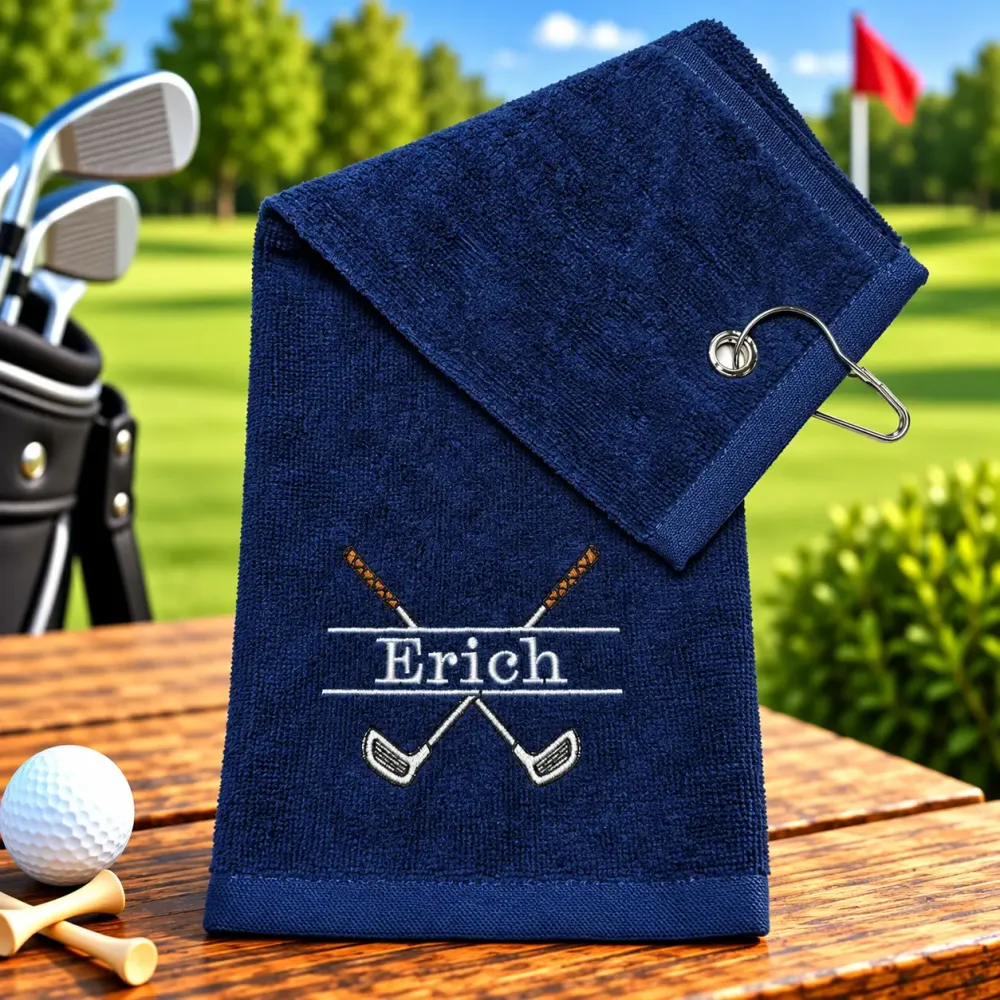 Marineblaues Golfhandtuch mit Name Erich in Grau bestickt
