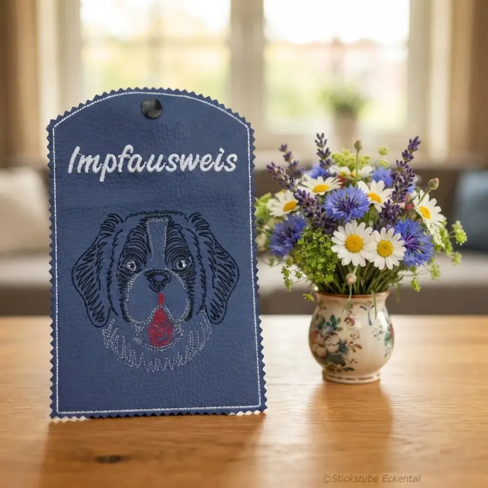 Dunkelblaue Impfausweishülle St. Bernard fertig bestickt